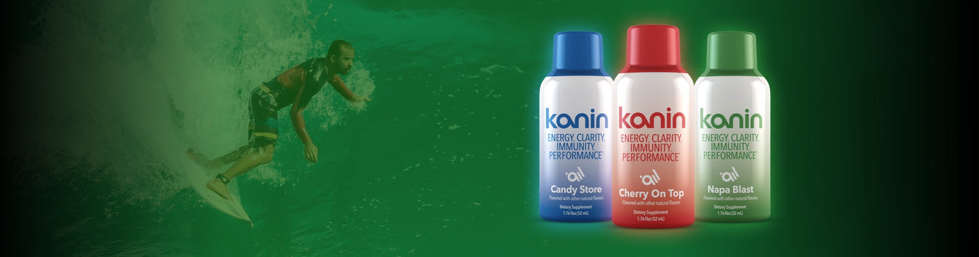 About Us hero banner. Person surfing on an ocean wave after taking Kanin's fast energy drink, similar 5 hour energy, but with better ingredients! Kanin features ingredients that boost not only your body but your brains performance, ensuring you are ready to tackle any task.
